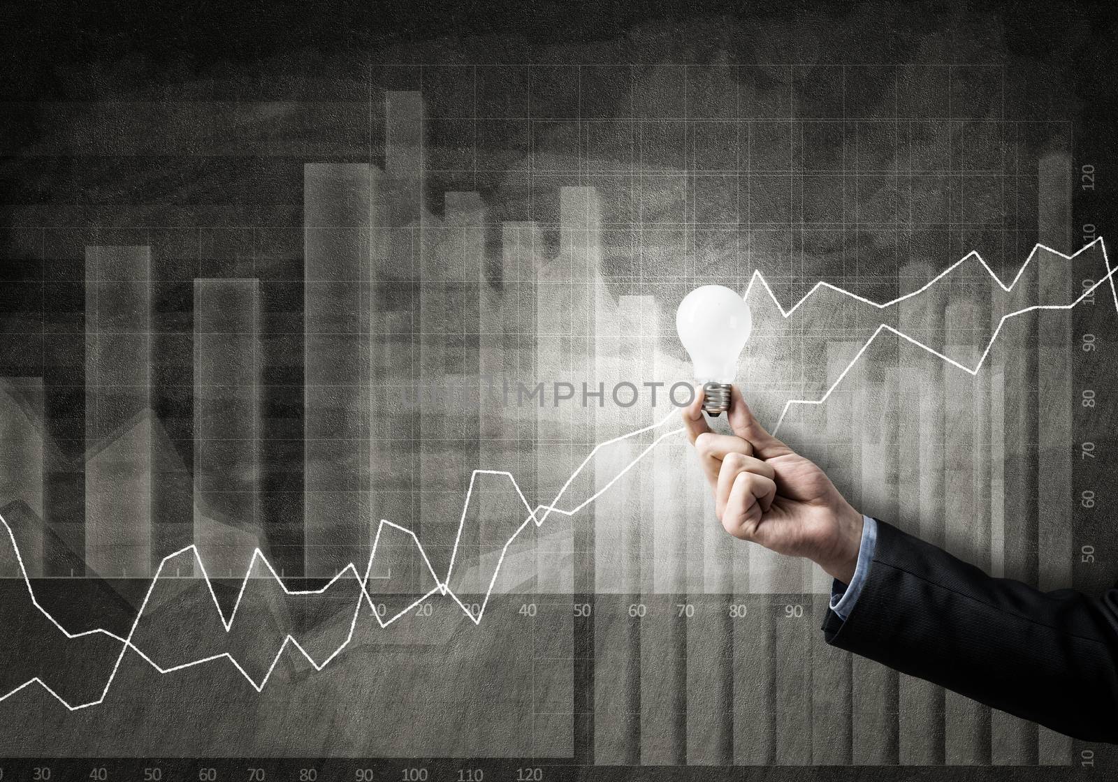 Conceptual image with light bulb diagrams and graphs