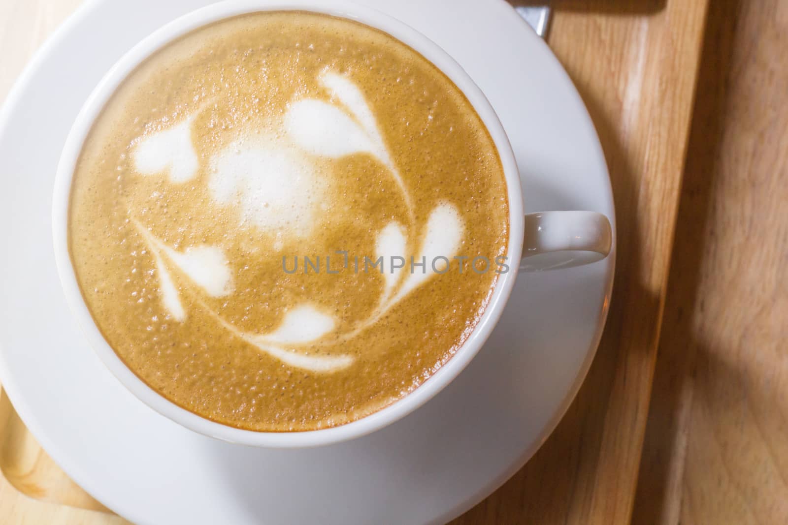 flower-shaped pattern of coffee latte art, relax food drink, valentine's day for background