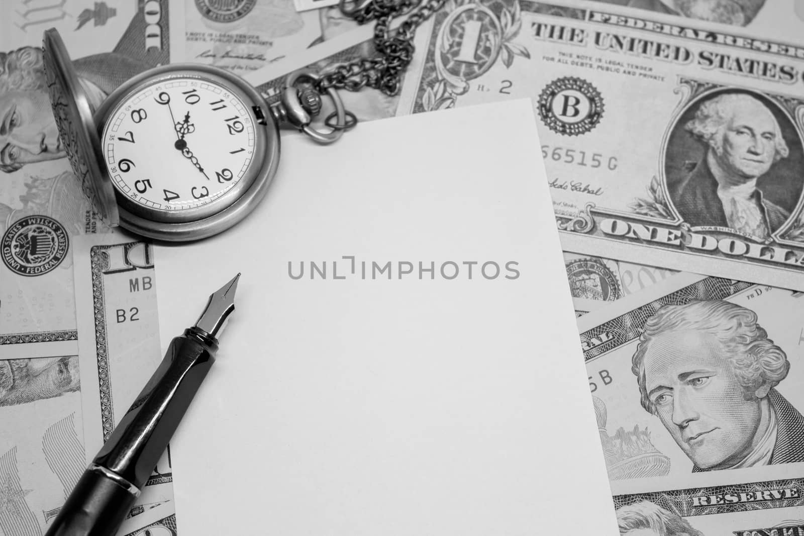 fountain pen, empty paper and classic pocket watch on dollar banknote, concept and idea of time value and money, business and finance concepts.