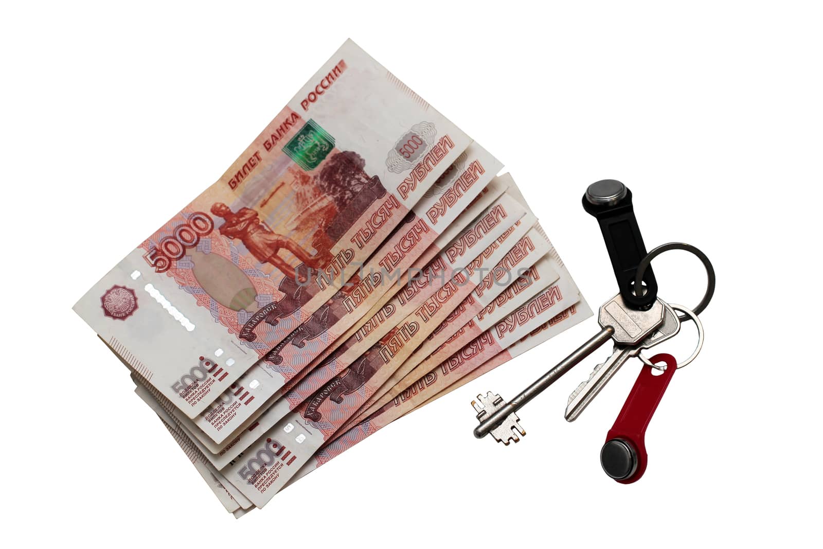 House keys and Russian money against the isolated background. Rental estate.