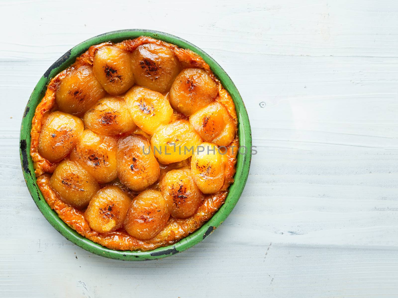 close up of rustic golden french apple tarte tatin