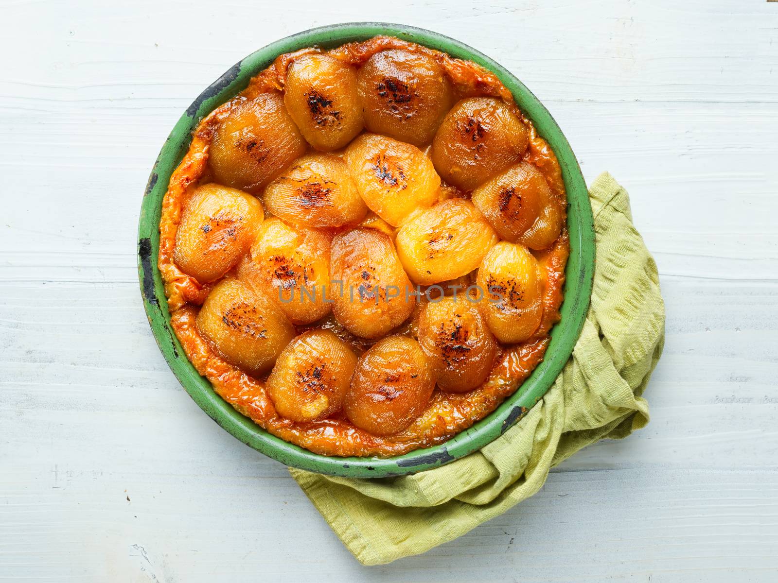 close up of rustic golden french apple tarte tatin