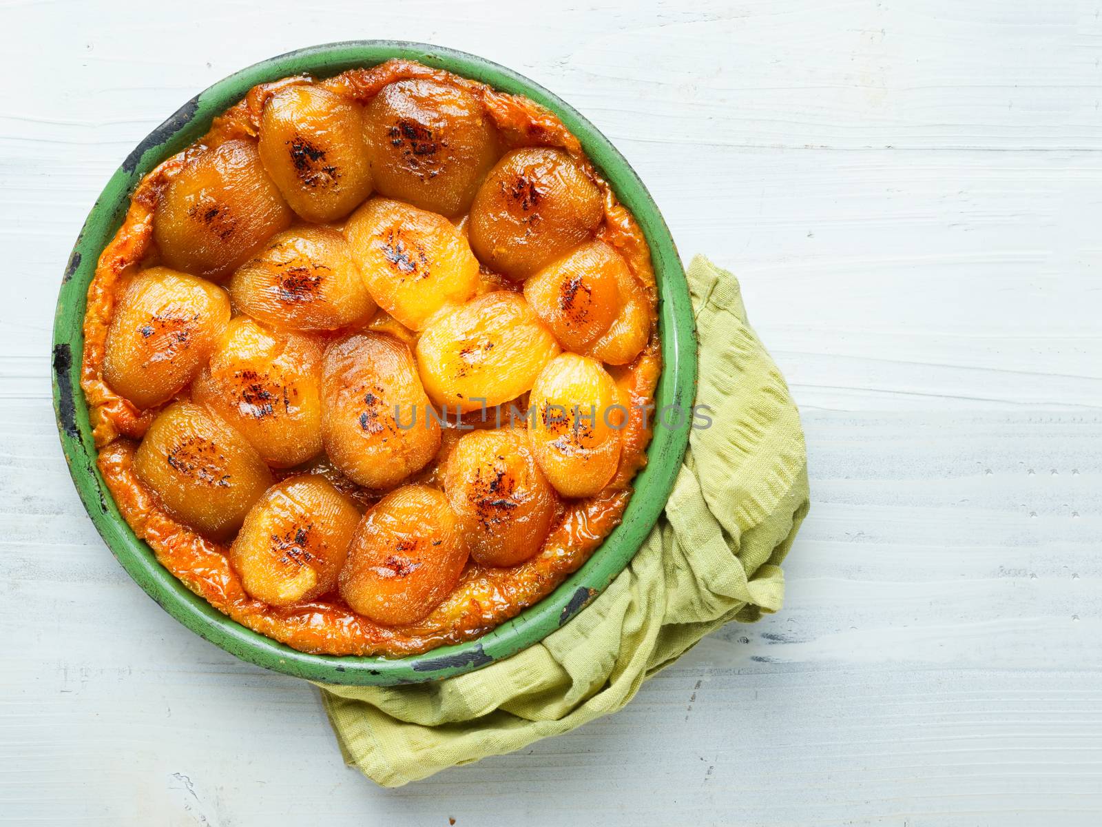 close up of rustic golden french apple tarte tatin