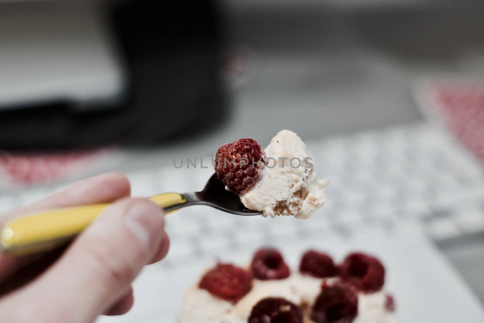 Delicious and fresh home made tiramisu with raspberry. Sweet food concept.