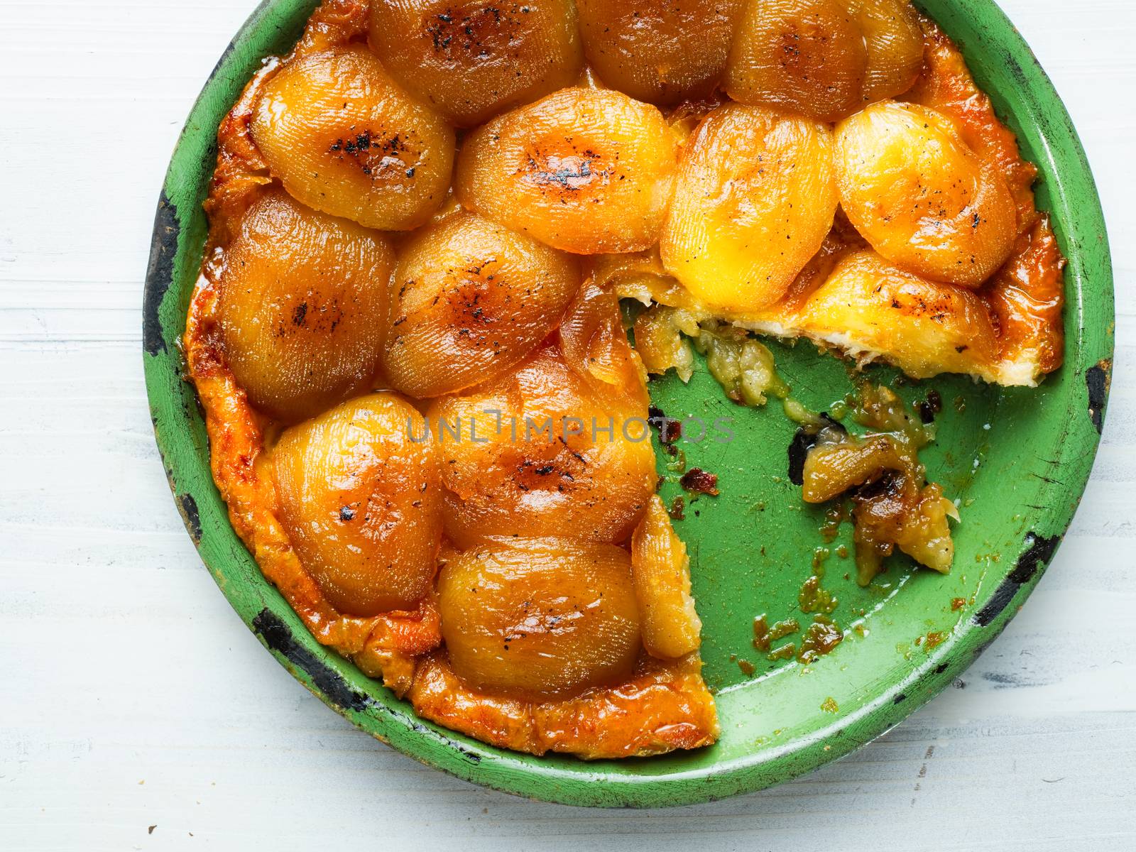 close up of rustic golden apple tarte tatin