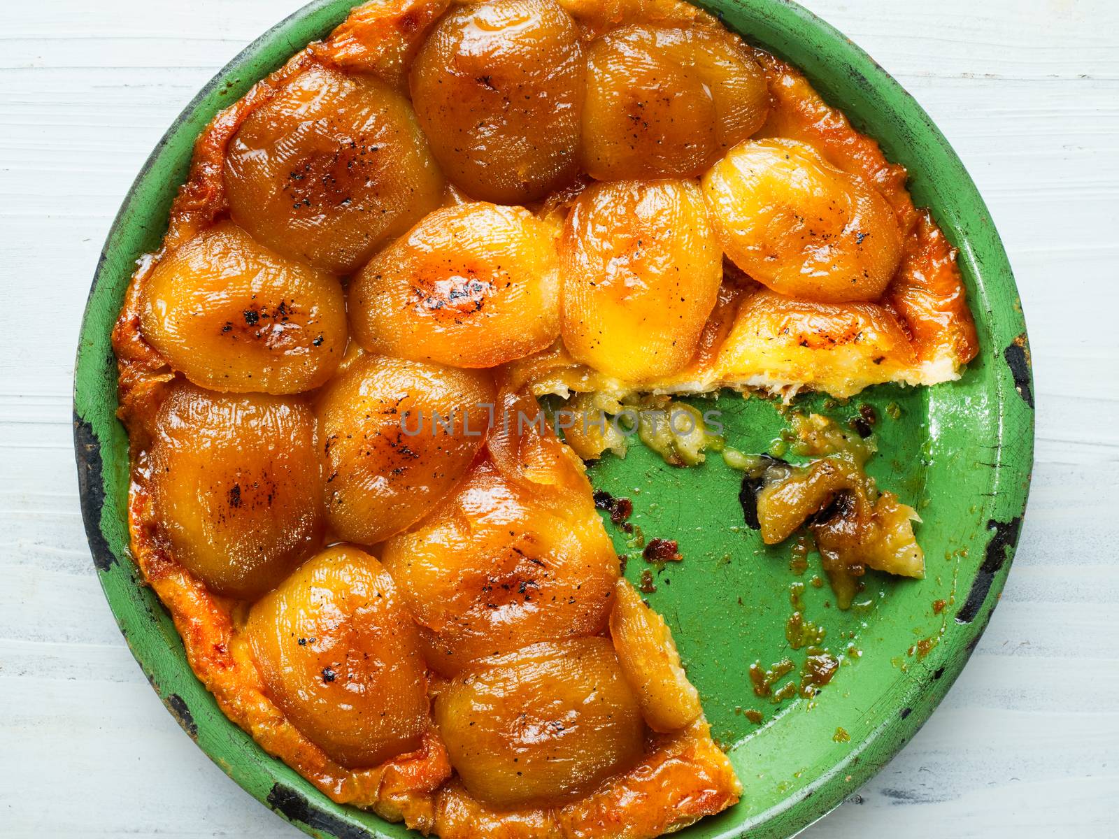 close up of rustic golden apple tarte tatin