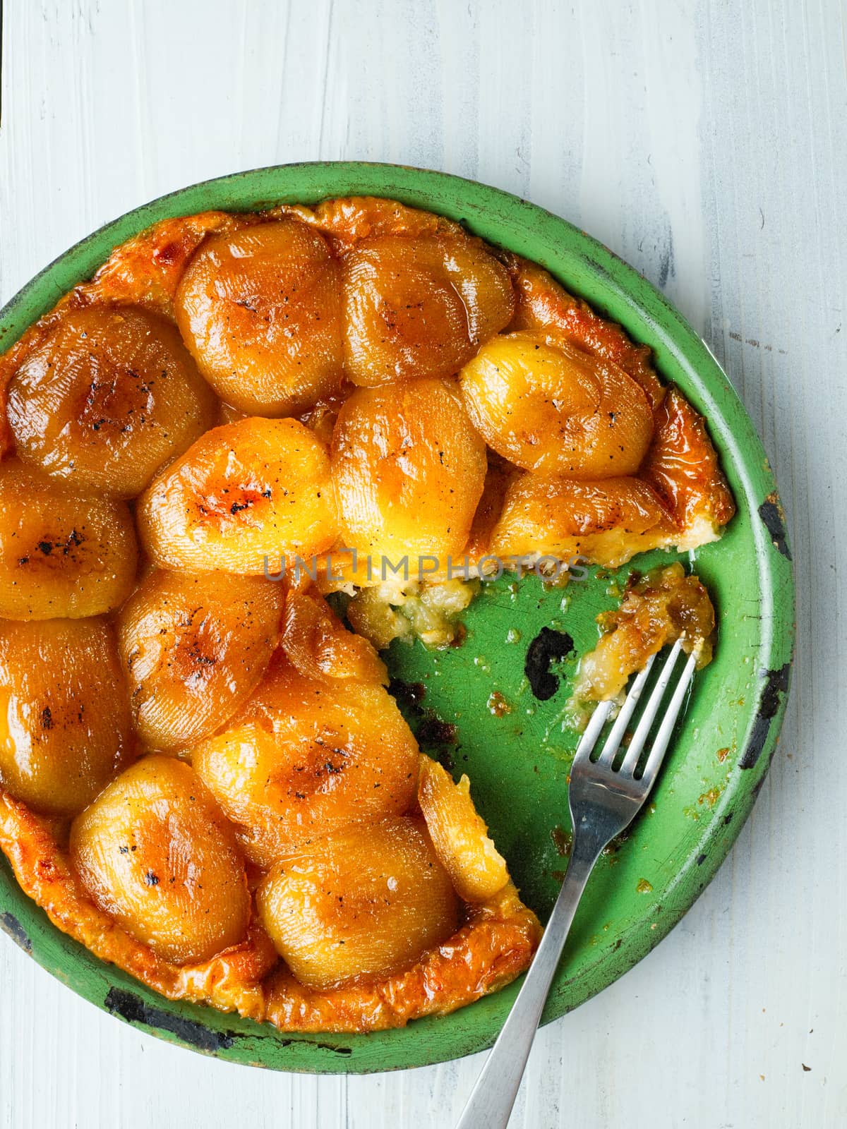 close up of rustic golden apple tarte tatin