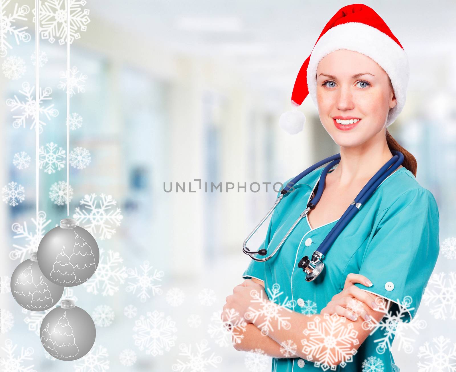 Smiling doctor wearing red santa hat, christmas time concept