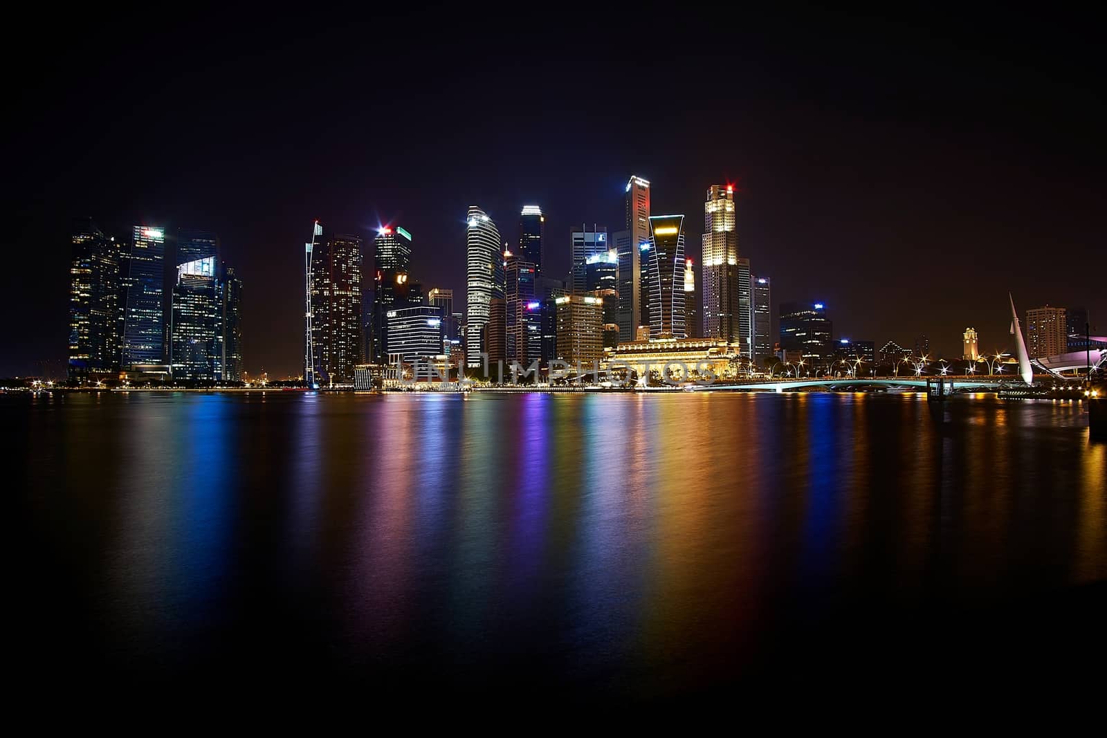 Singapore city skyline at dusk, Marina bay skyline, Singapore.