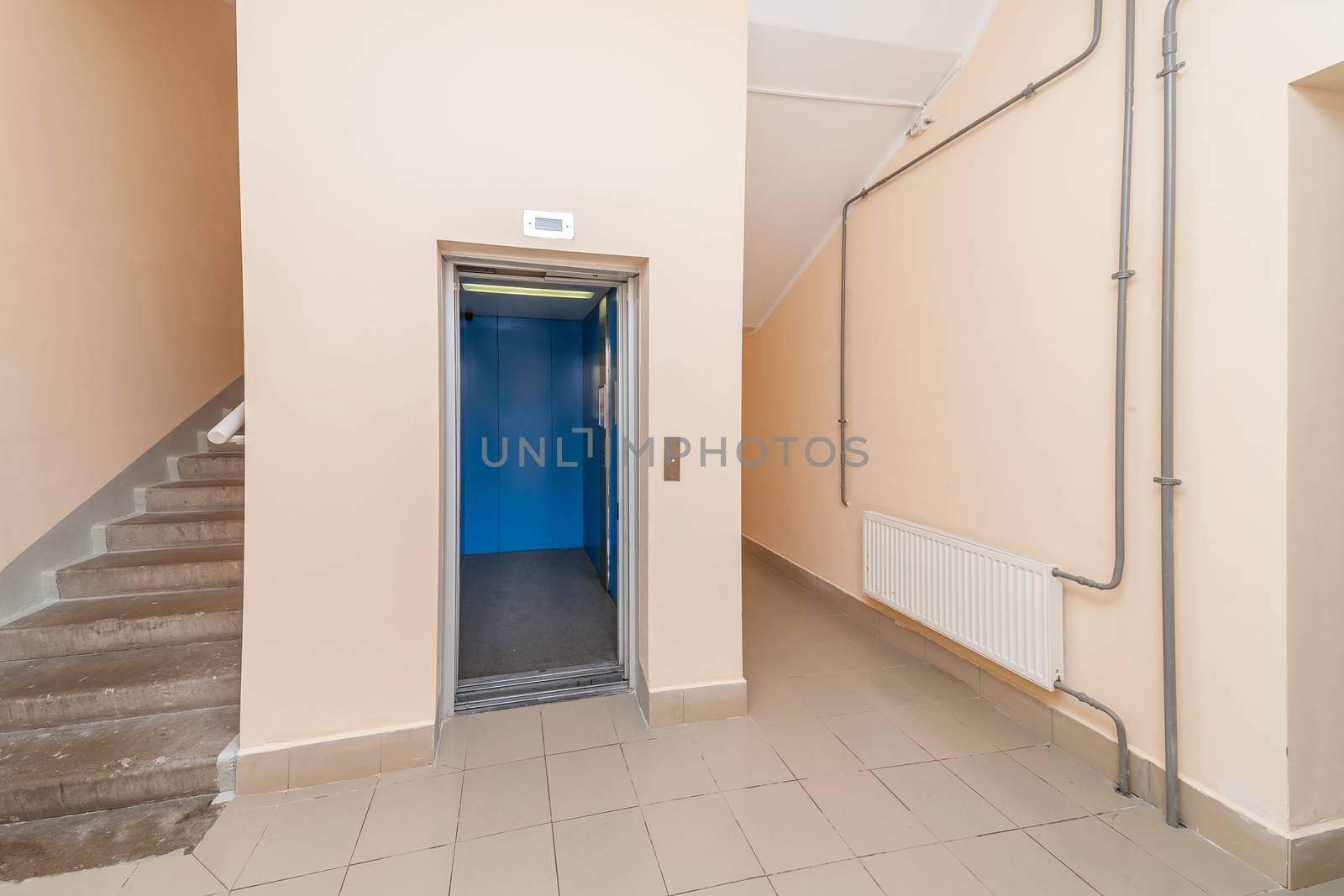 Elevator and stairs up and down in a modern elegant building