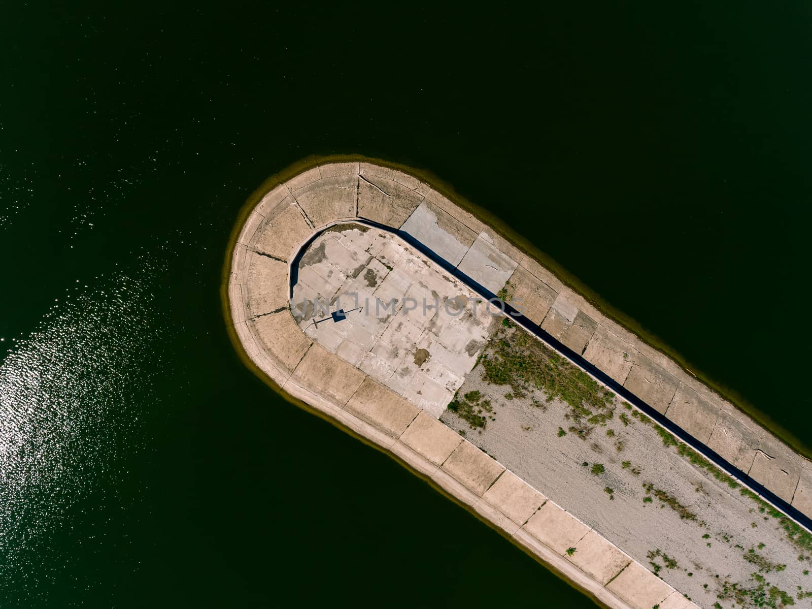 Aerial view breakwater at sea, cutwater, pier, groyne mole