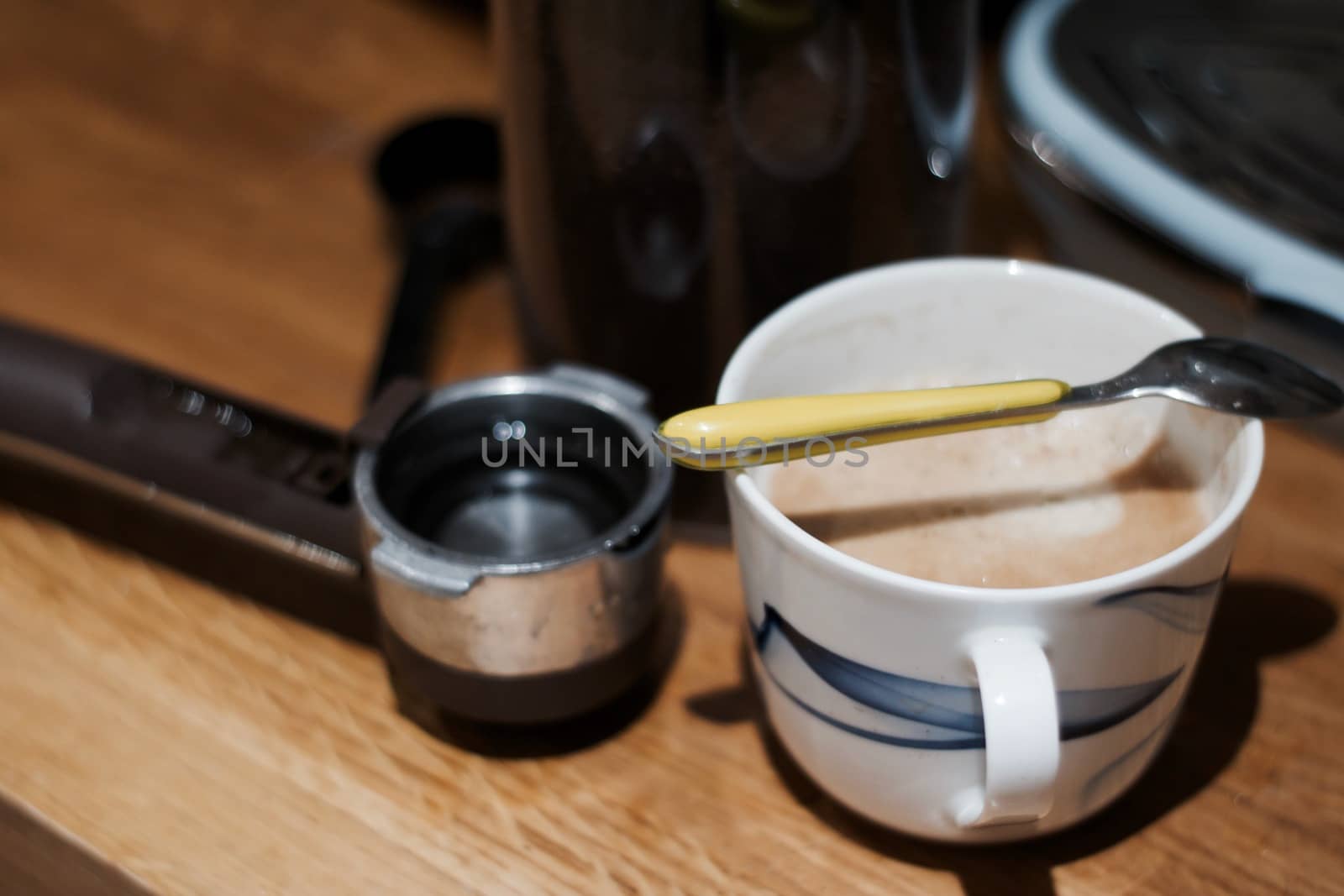 Fresh and tasty coffee in the kitchen on the wooden board. Drink concept.