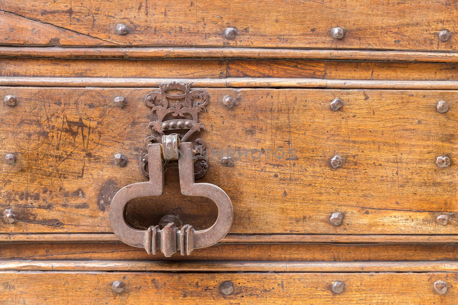 Italy: Close up of rustic old door by alanstix64