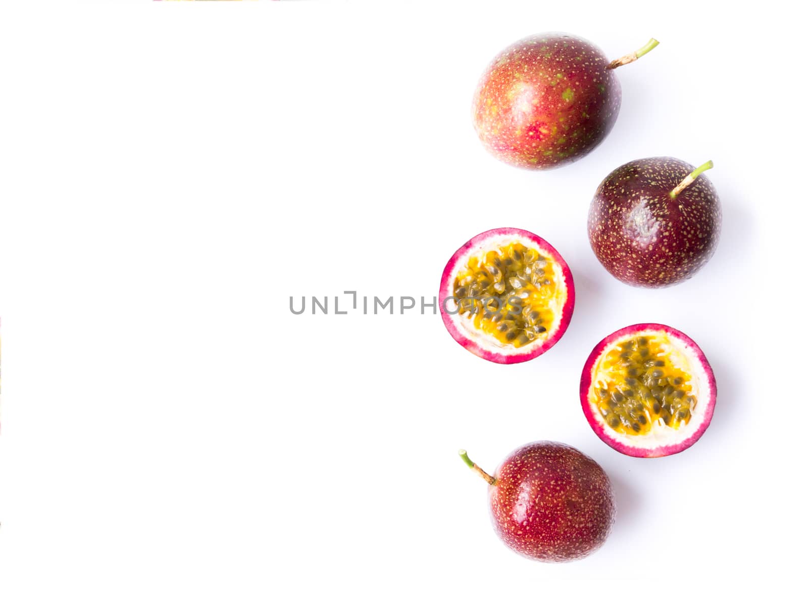 Closeup top view passion fruit on white background, fruit for healthy concept