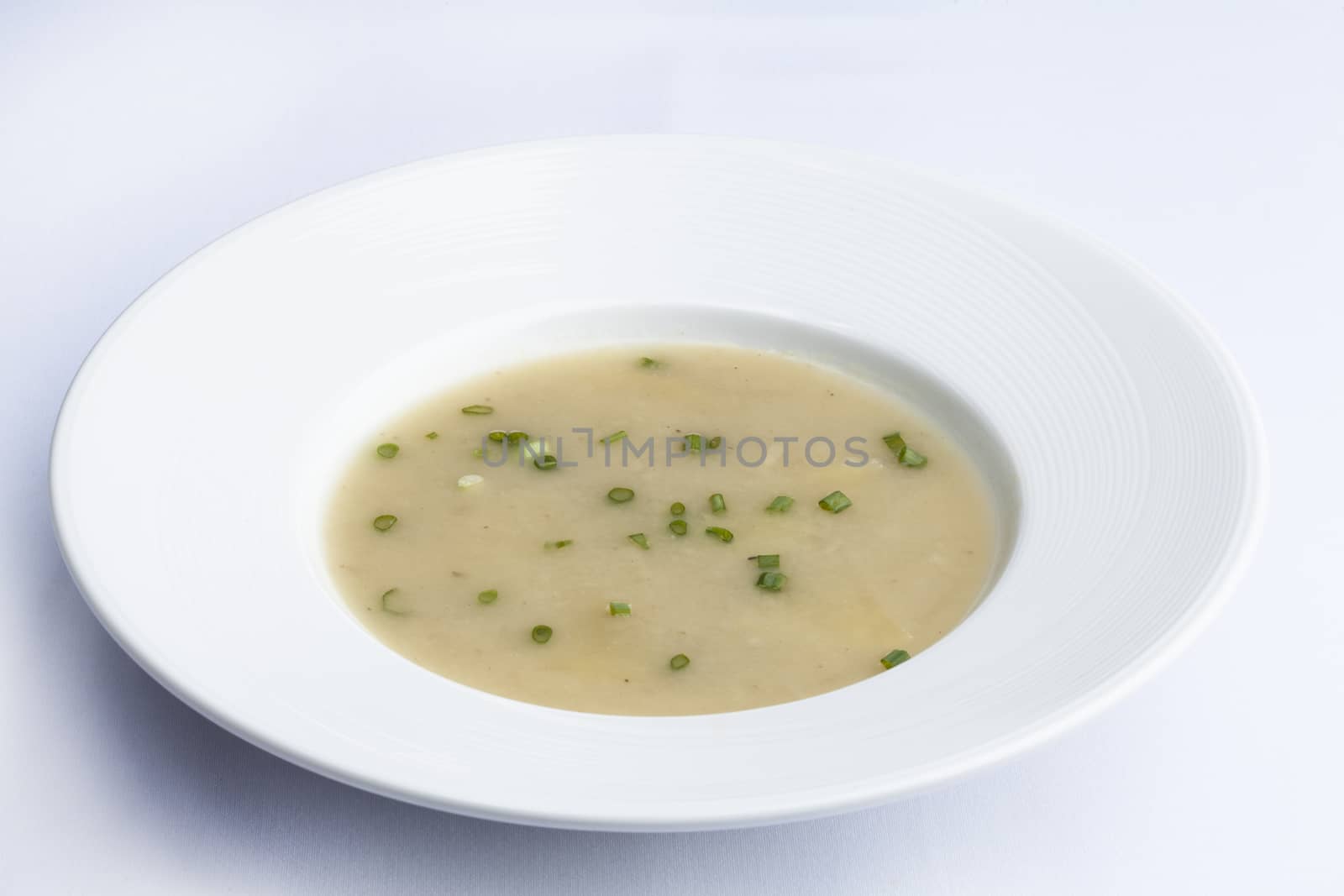 Parsnip cream soup on White floor by jee1999