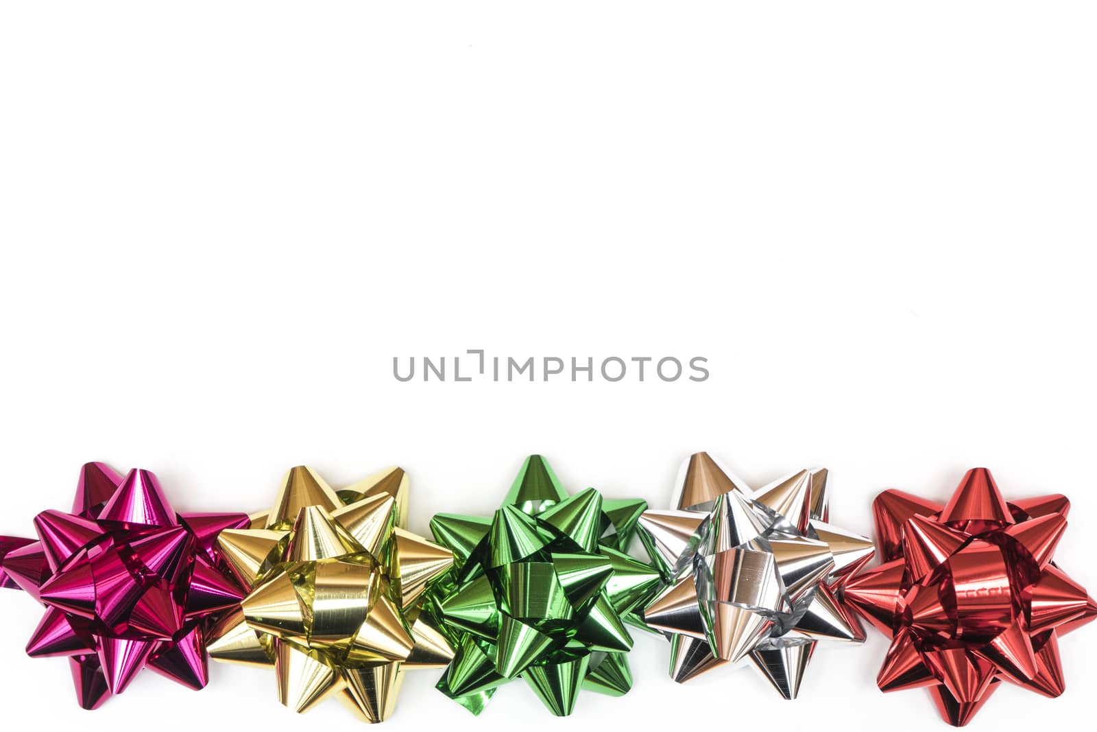 row of colored bows on a colored background