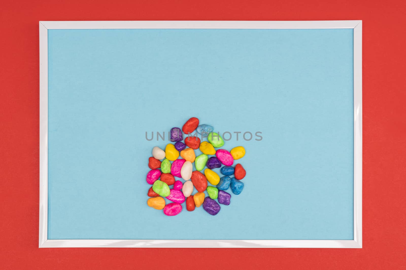 small colored pebbles on a colored background