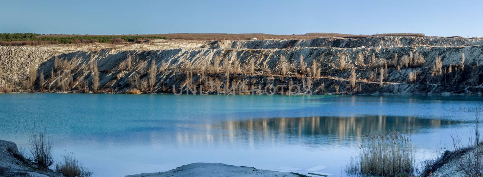 Lake emerald-turquoise color formed in an old quarry