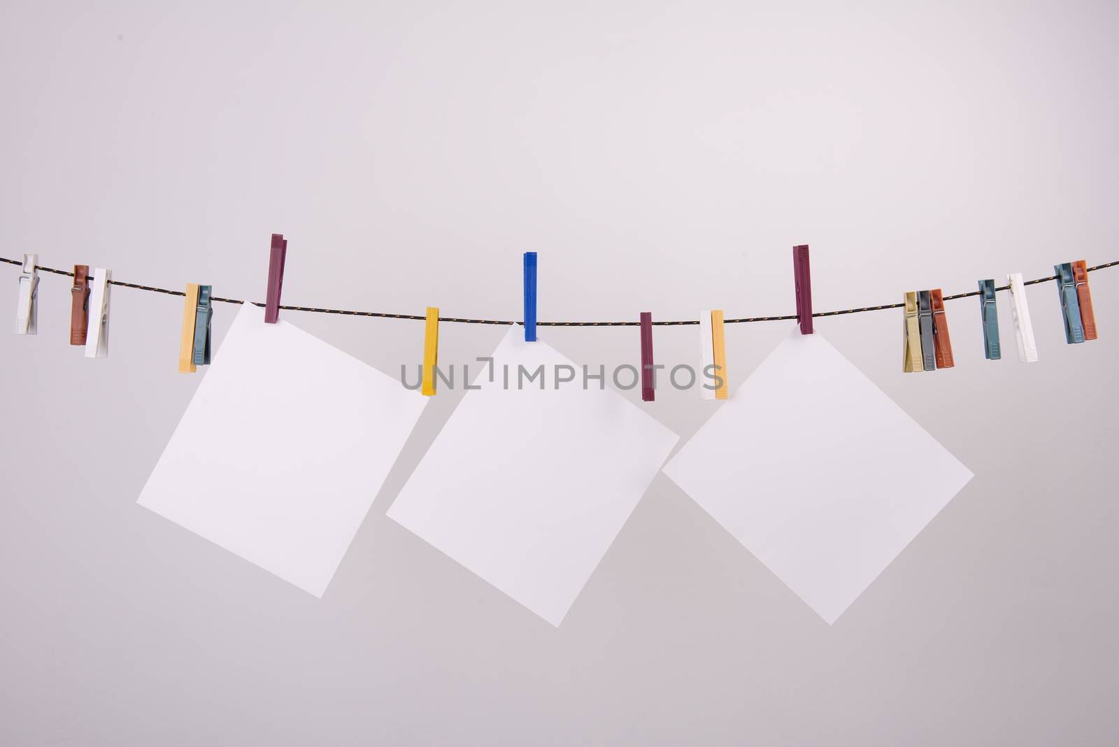 white paper sheets hanging