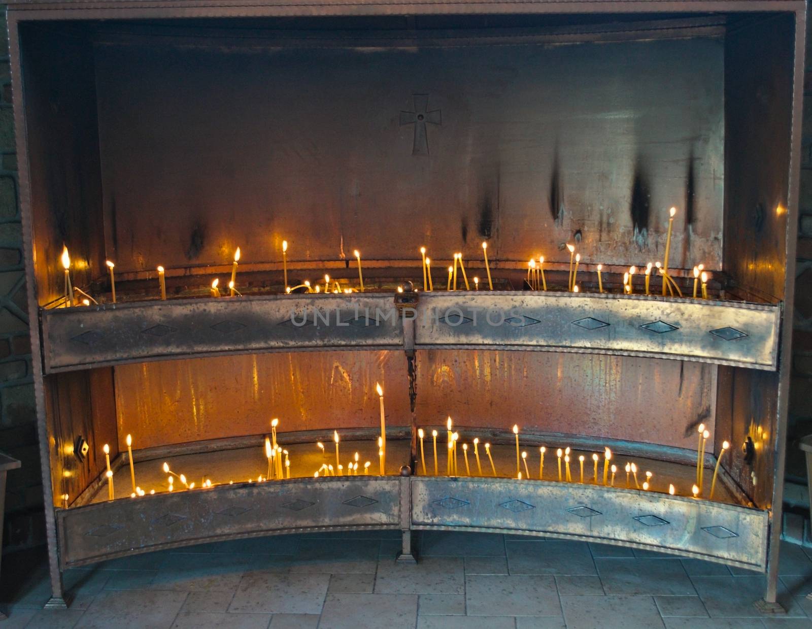 Place for lightning candles in Serbian Monastery by sheriffkule