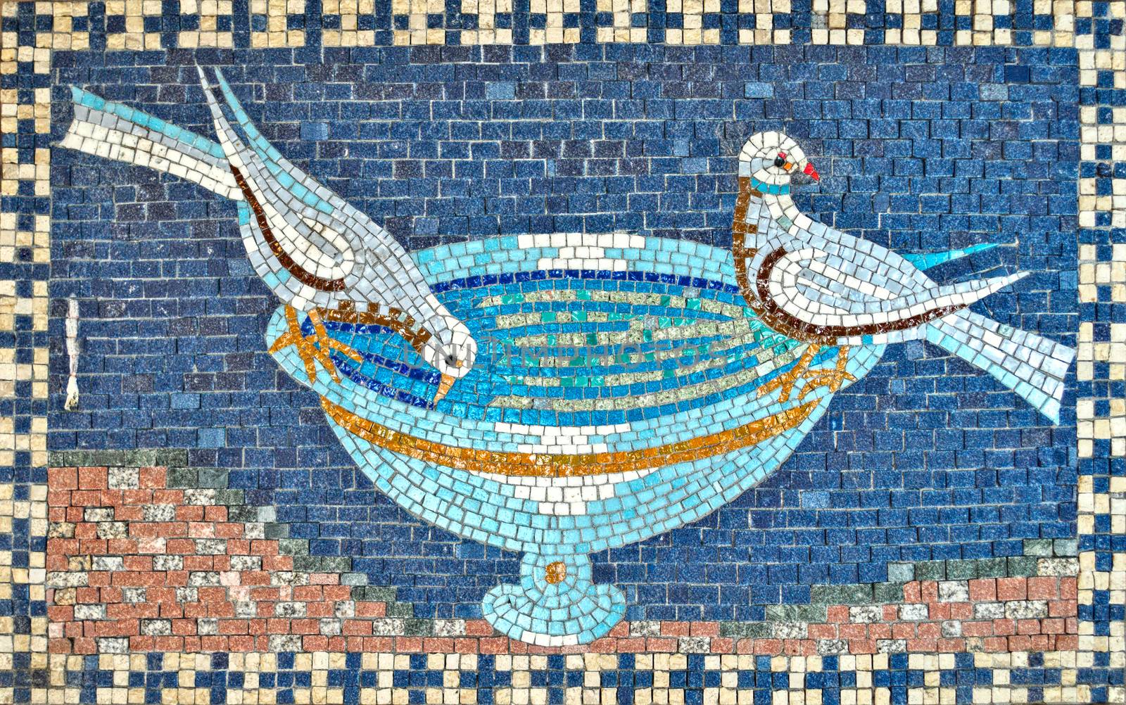 Beautiful mosaic with two pigeons drinking from bowl