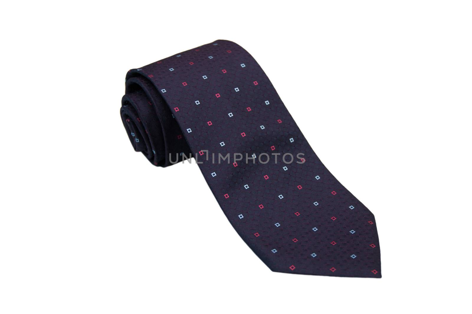 Closeup of an elegant stylish tie rolled and isolated on a white background by 3KStudio