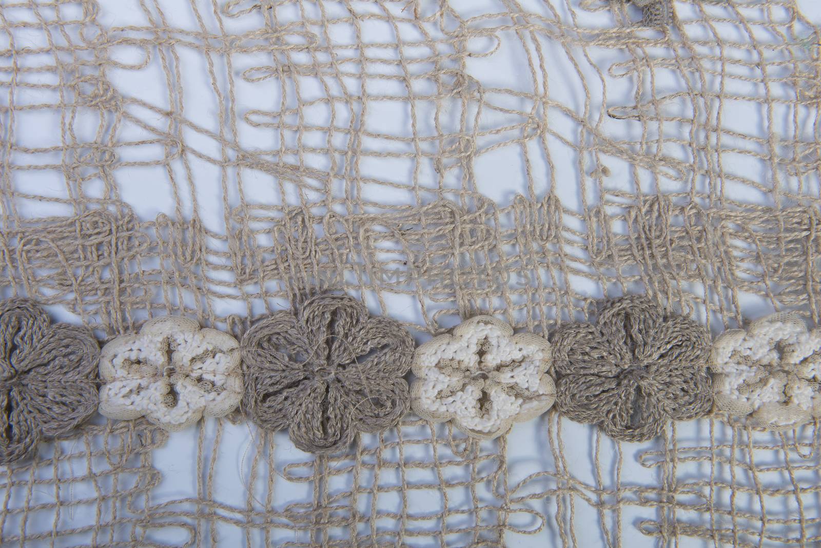 the texture of the embroidery of a fabric