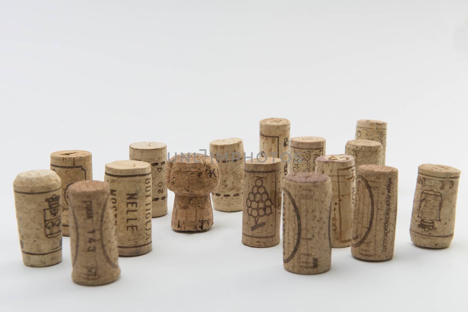 corks on a white floor