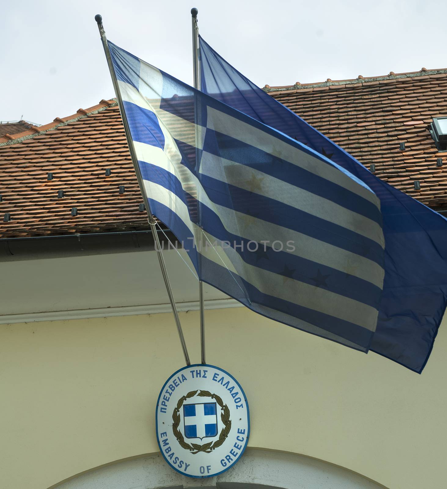 Greek and European flags in front of greek consulate in Pula, Croatia