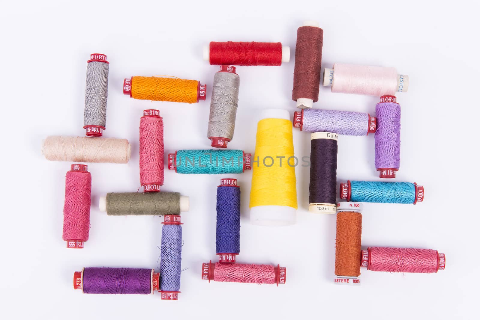 spools of colored thread for sewing