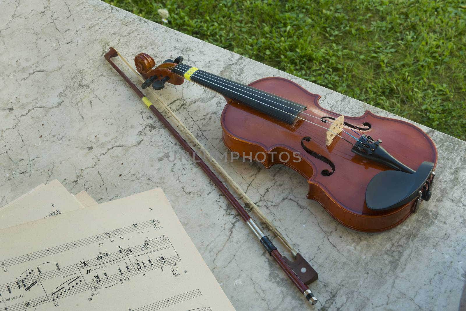 a violin and a musical score