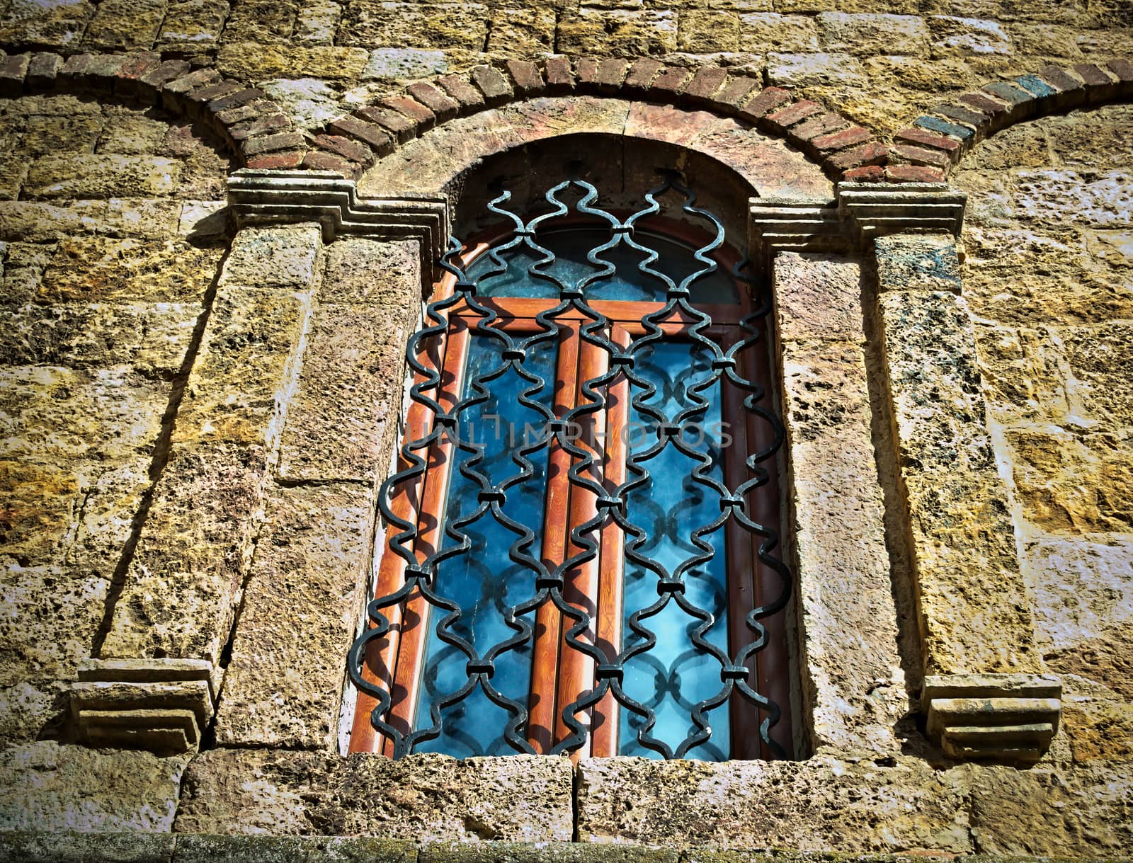 Window on old stone monastery in Serbia by sheriffkule