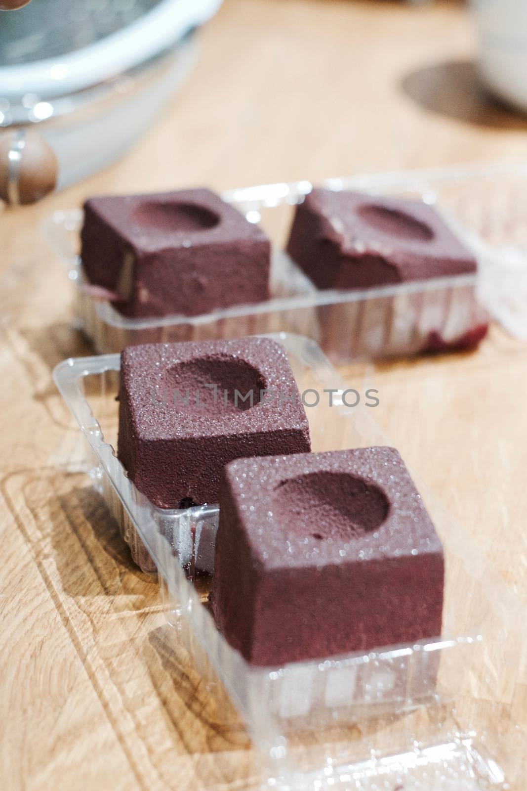 Delicious chocolate fresh and tasty cake with raspberry jam. Food concept.