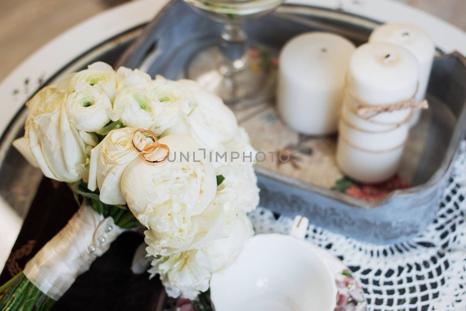 Beautiful wedding bouquet and rings. Wedding day.