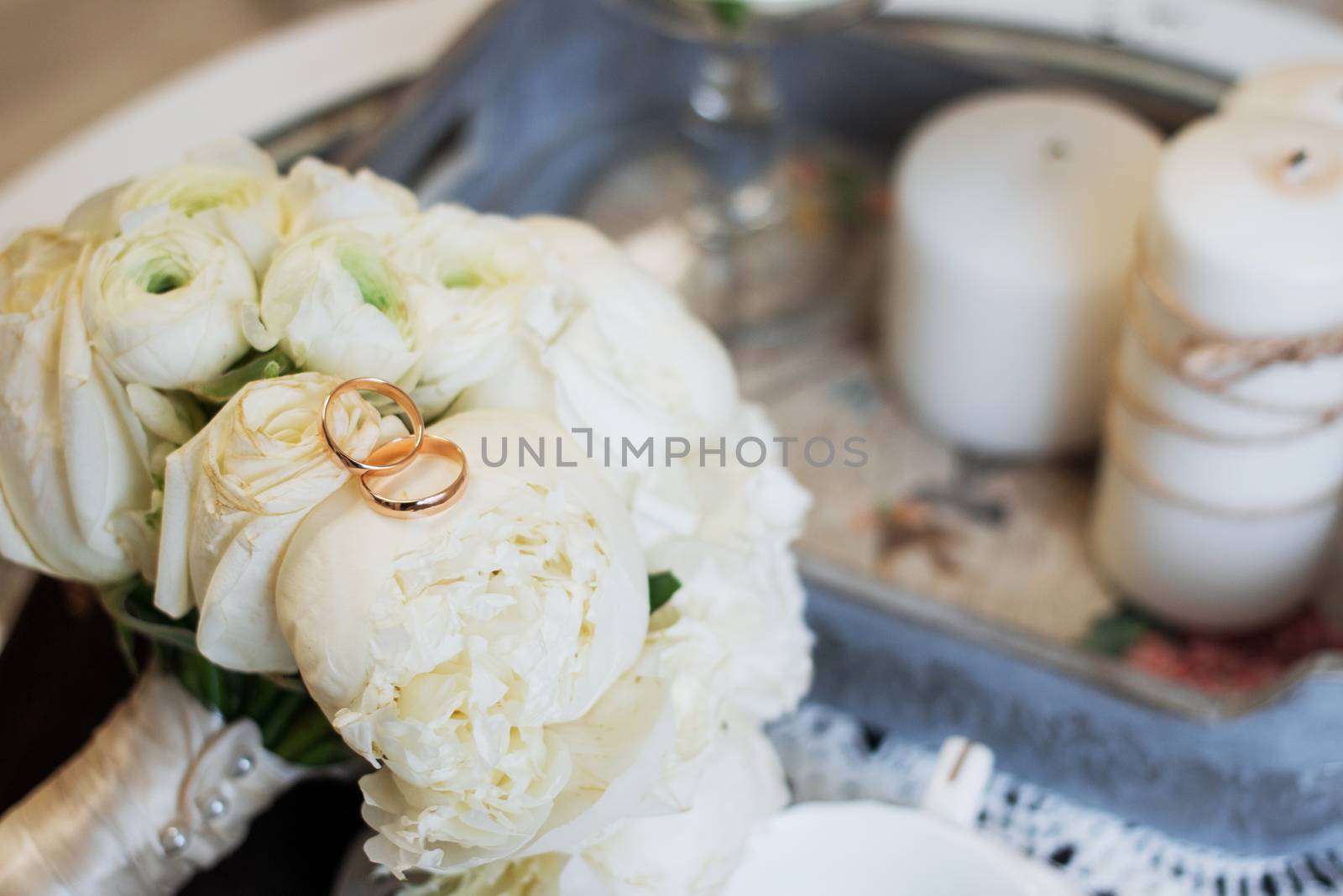 Beautiful wedding bouquet and rings. Wedding day.