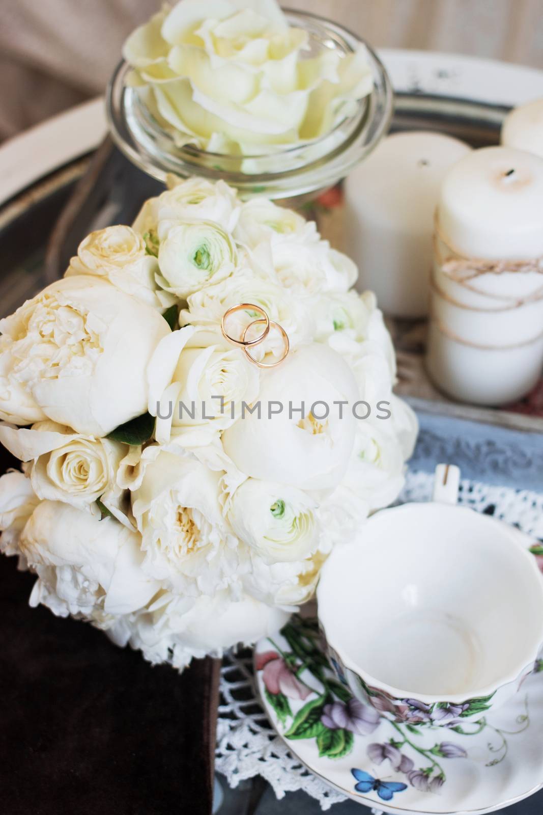 Beautiful wedding bouquet and rings. Wedding day.