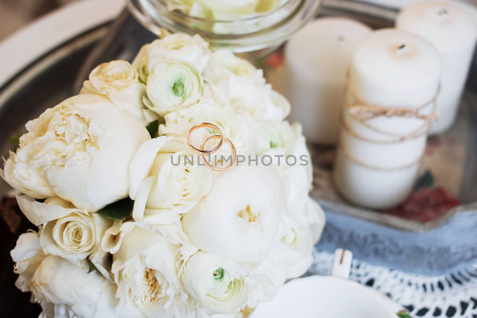 Beautiful wedding bouquet and rings. Wedding day.