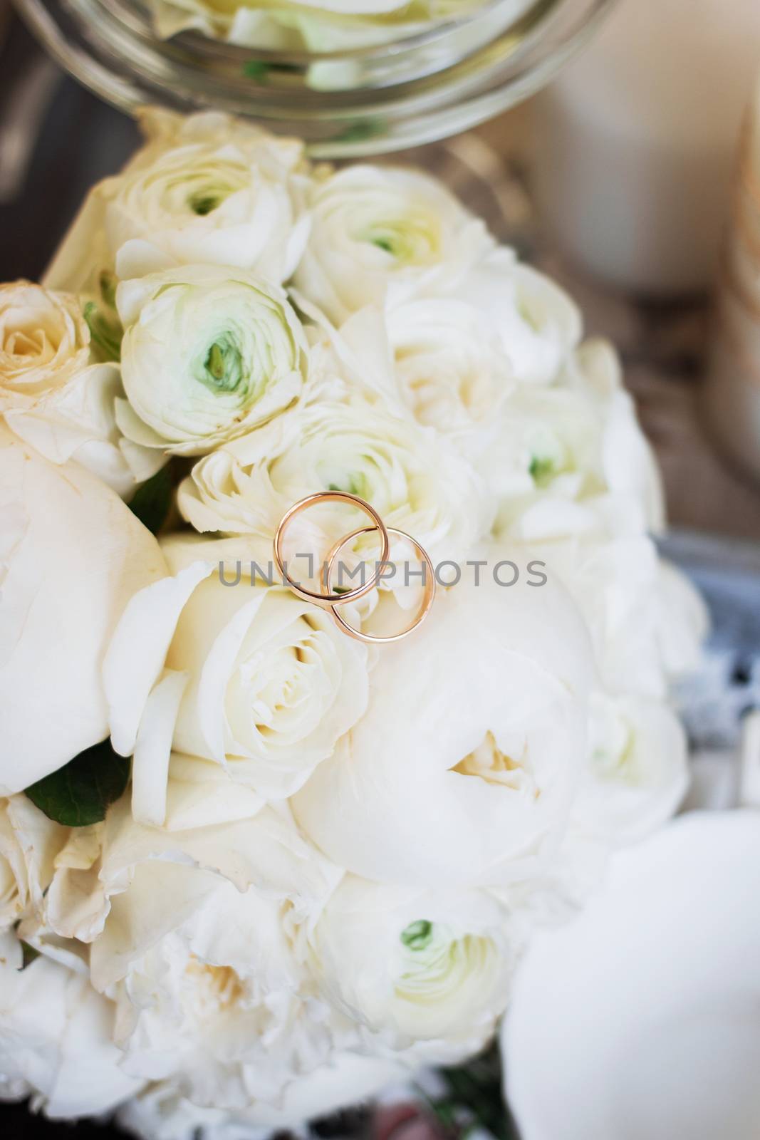 Beautiful wedding bouquet and rings. Wedding day.