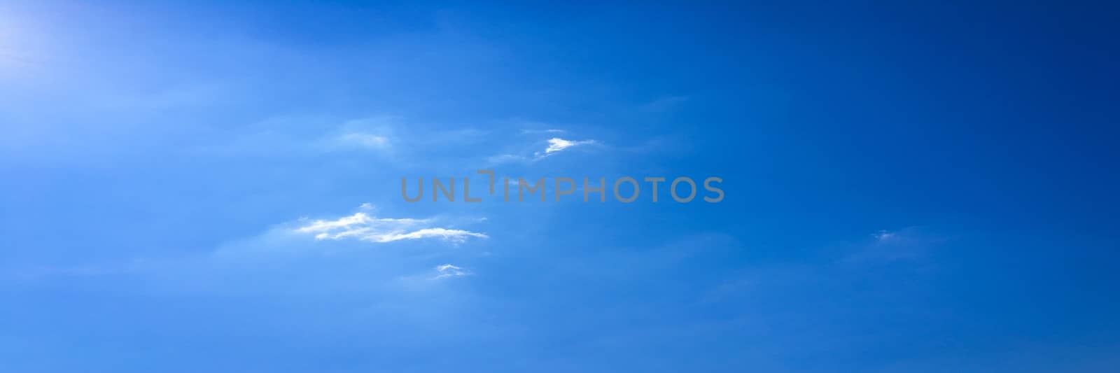 beautiful blue sky with clouds background.Sky with clouds weather nature cloud blue.Blue sky with clouds and sun. by titco