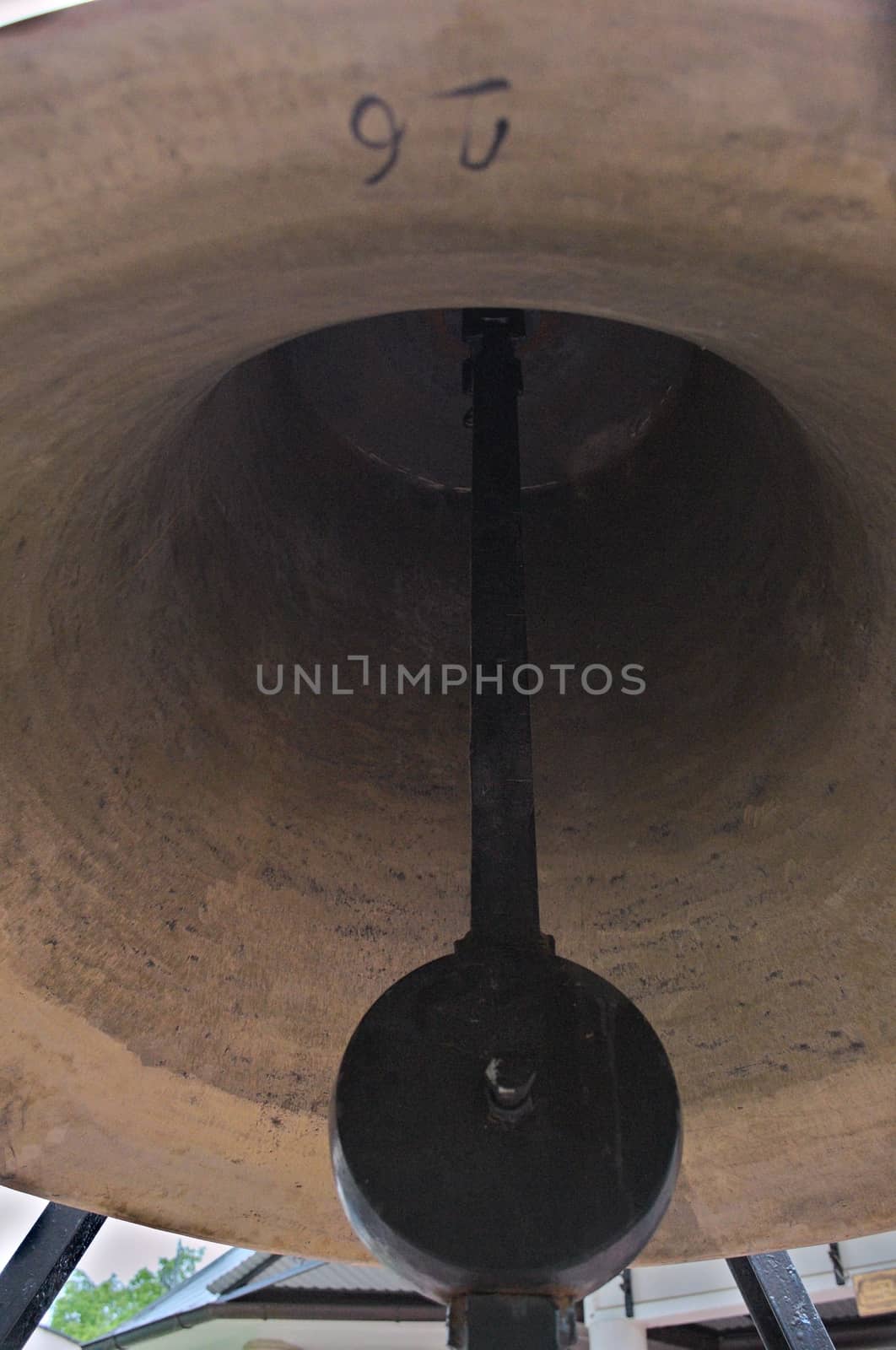 Inside of big bronze bell in monastery in Serbia by sheriffkule