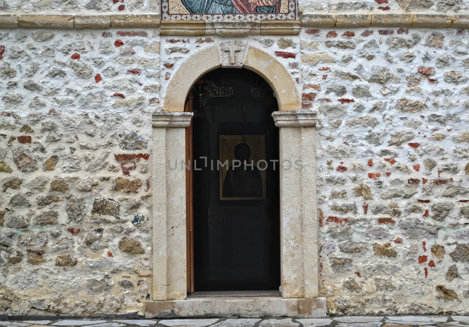 Entrance into main stone church monastery Hopovo in Serbia by sheriffkule