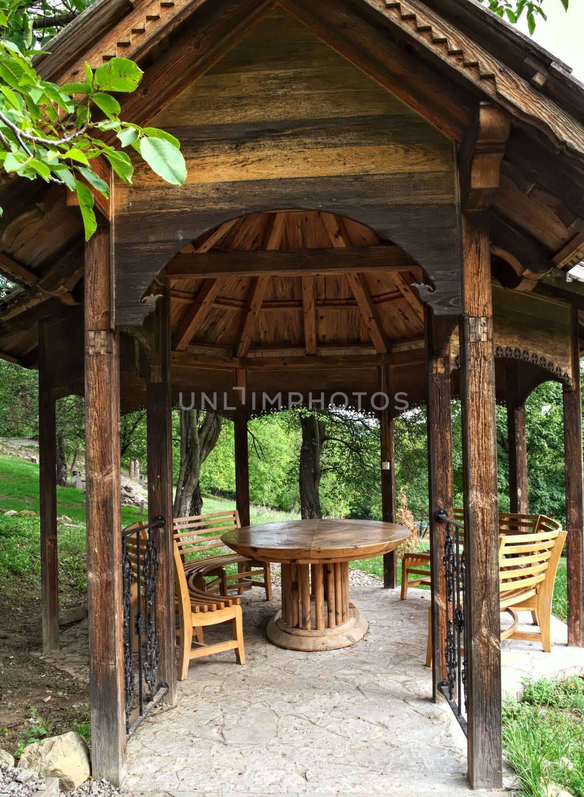 Wooden open dome for relaxing, in park by sheriffkule