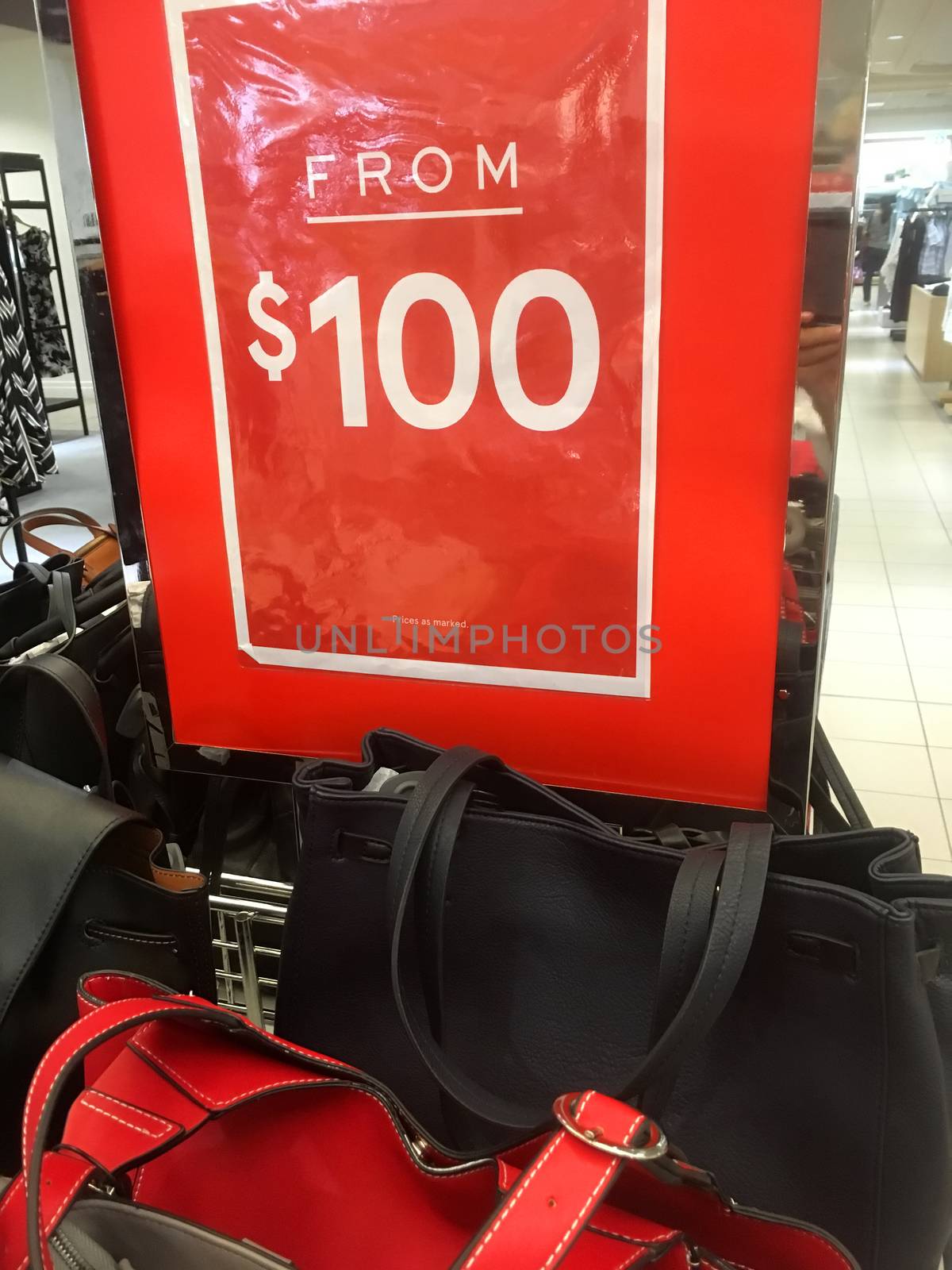 Sale sign for ladies leathergoods handbags