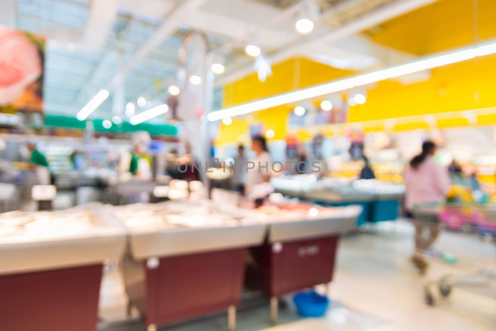 Abstract Blur Defocus Background of People Shopping Meat or Pork Products in Hypermarket or Supermarket Convenience Store Outlet as Modern Lifestyle Concept.