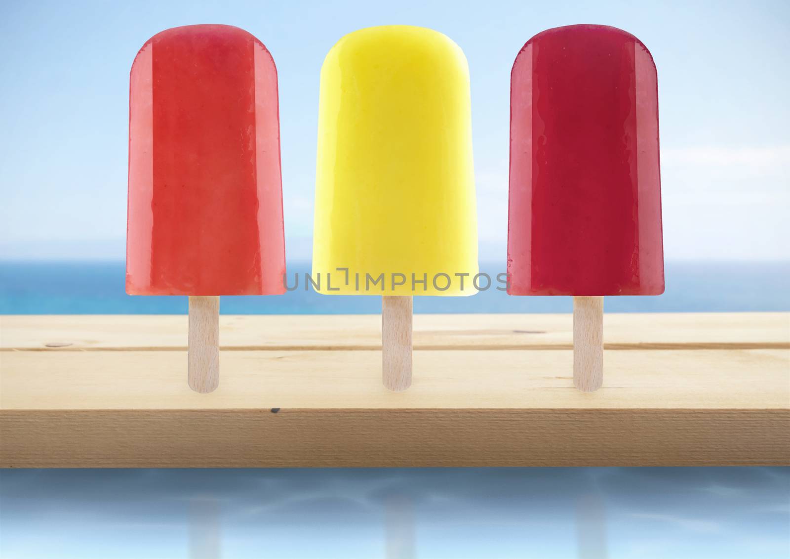 Assorted ice lollies by the beach