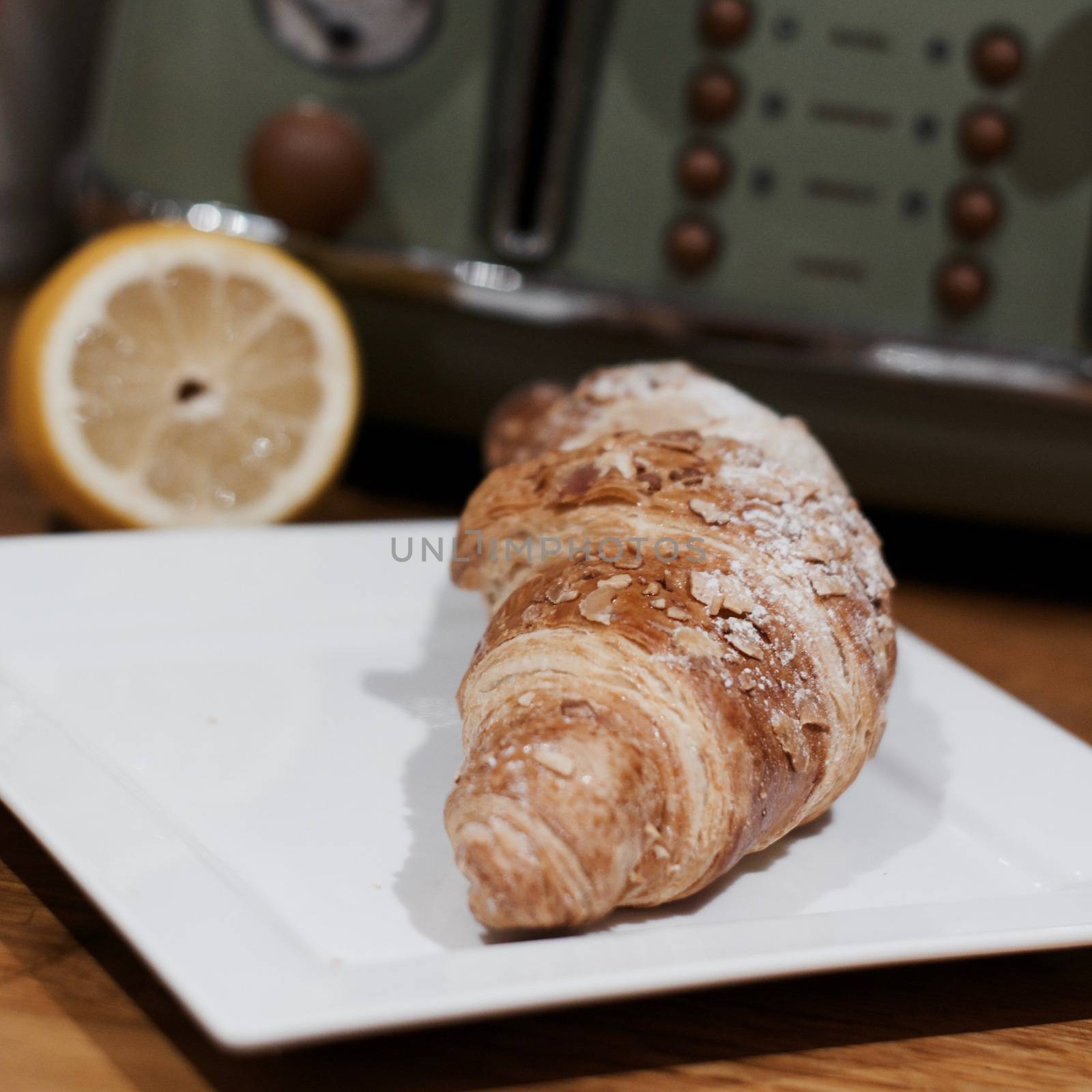 Delicious and fresh crossaint in the kitchen. Sweet food concept.