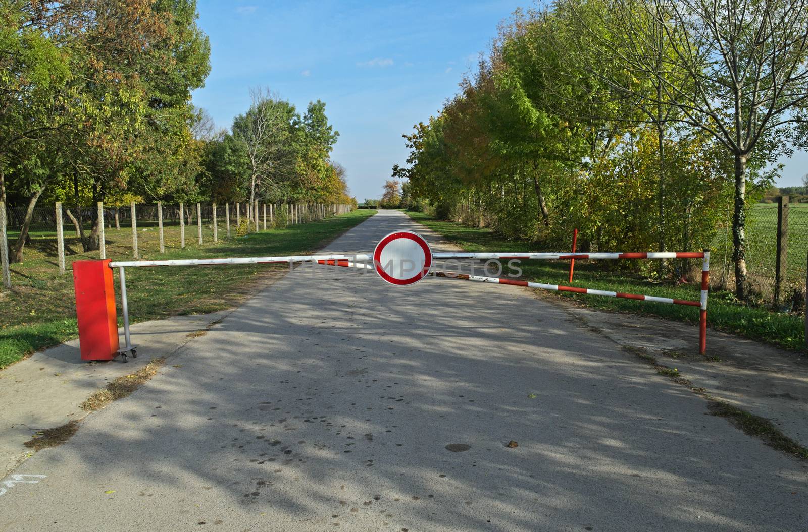 Closed road with sign and barrier by sheriffkule