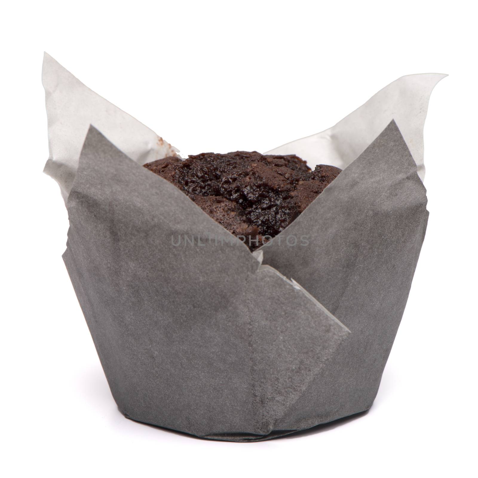 Closeup of a Magdalena Typical Spanish Chocolate Muffin. Sweet Food or Dessert. One Fresh Baked Muffin Isolated on White Background in American Style. Irresistible Tasty Cake.