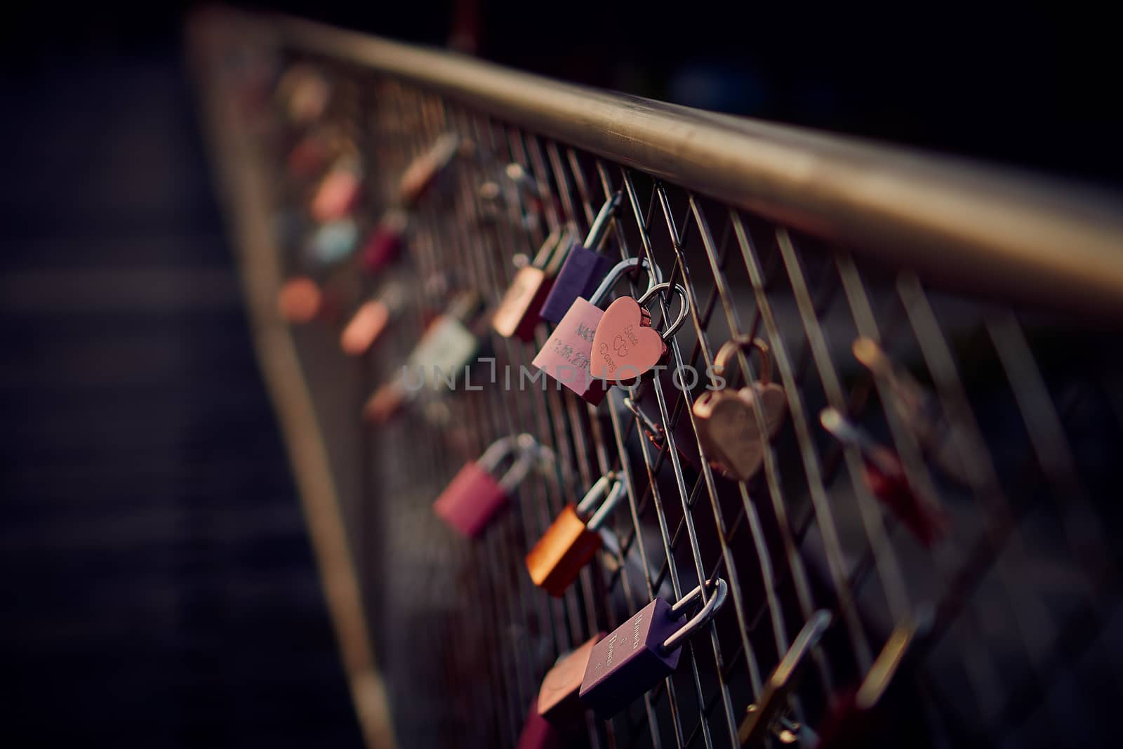 Heart shaped padlock on bridge in Munich Germany