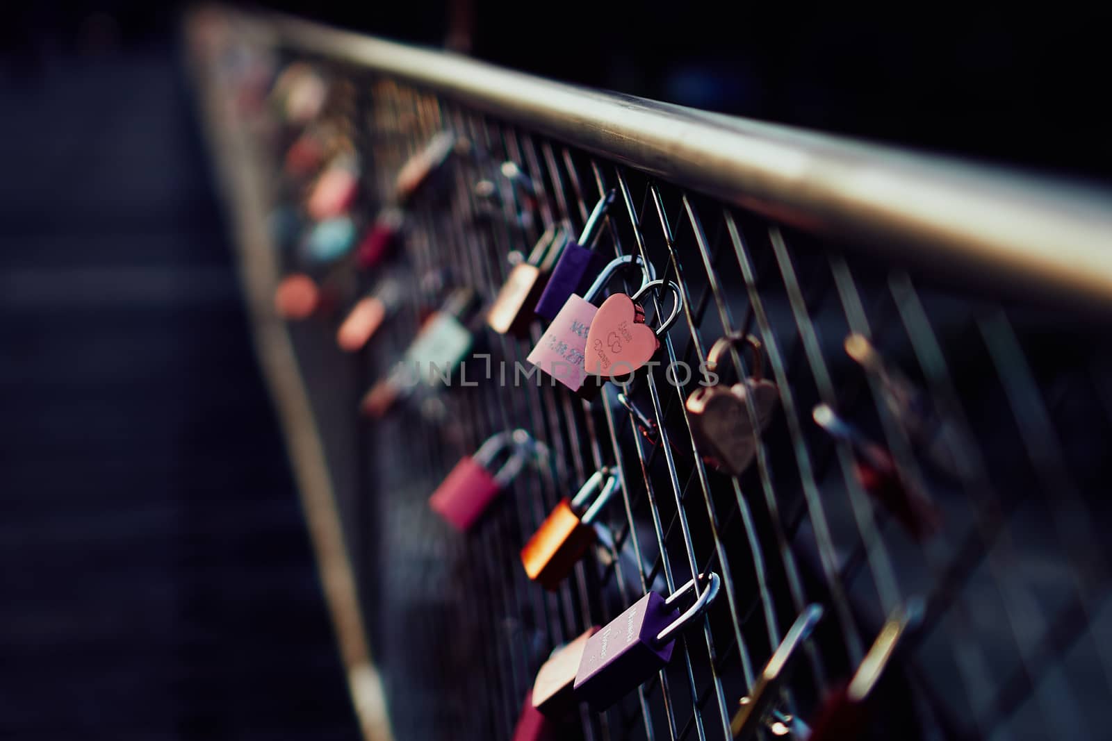 Heart shaped padlock on bridge in Munich Germany